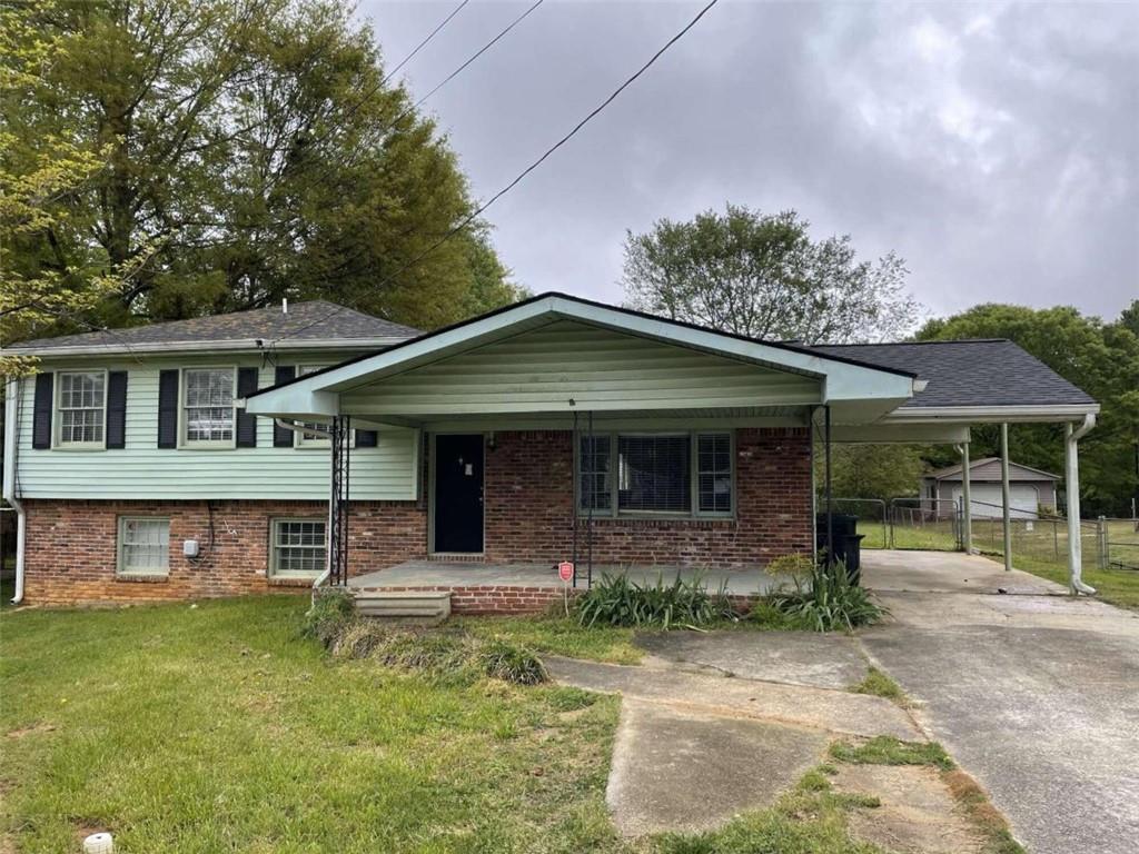 front view of a house with a yard