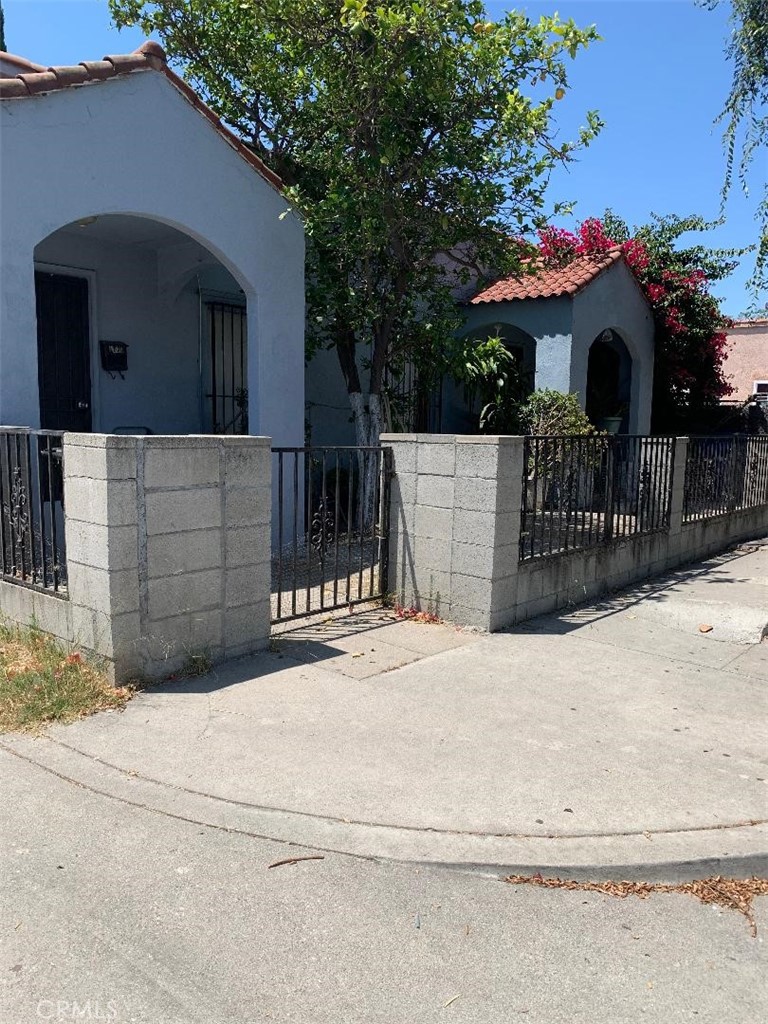 a front view of a house with a garage