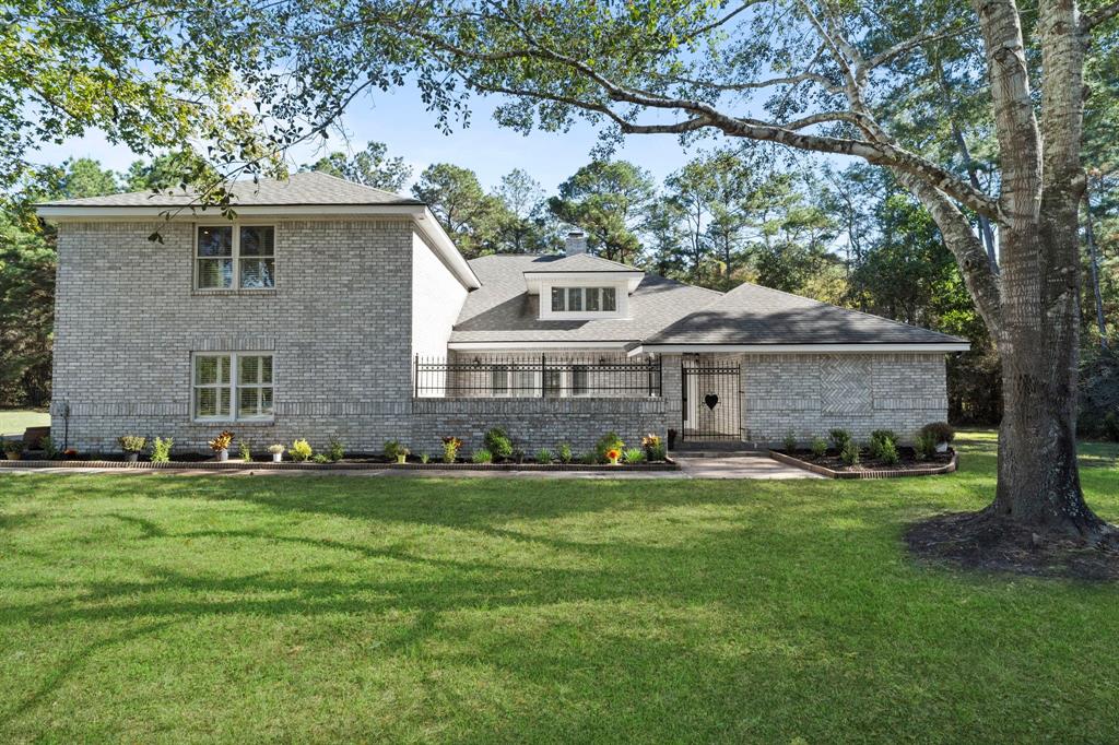 Nestled on over 4 bucolic acres, this modern, all brick 1.5 story is complete with everything you need to begin your new life in the country.