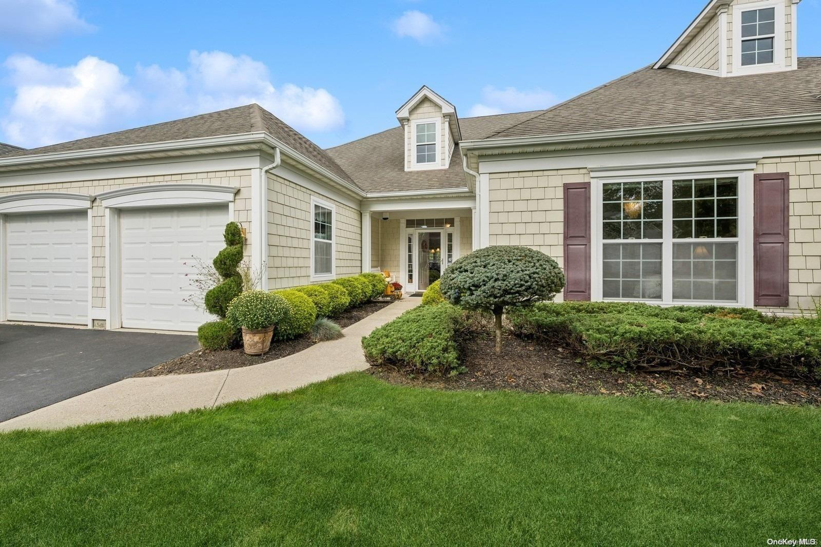 a house view with a garden space