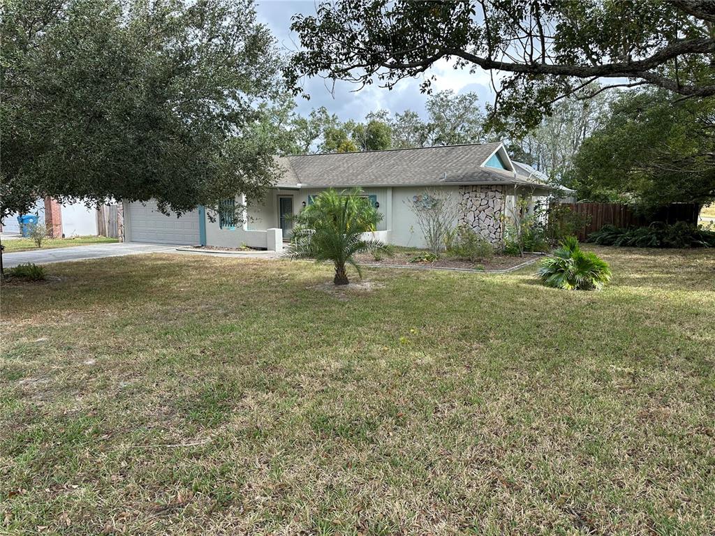 a house view with a garden space