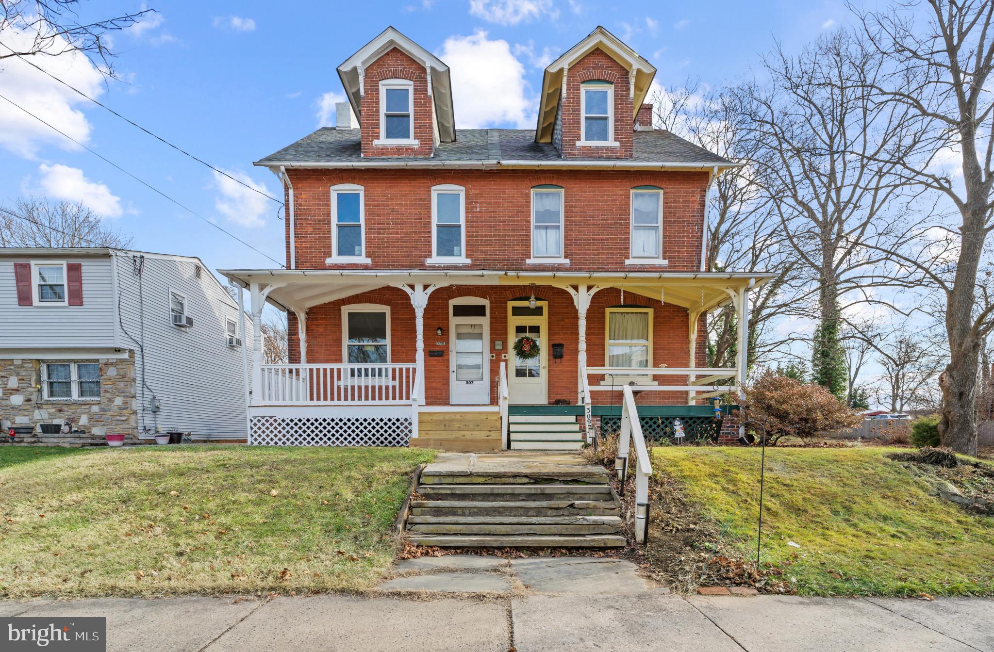 front view of house with a yard