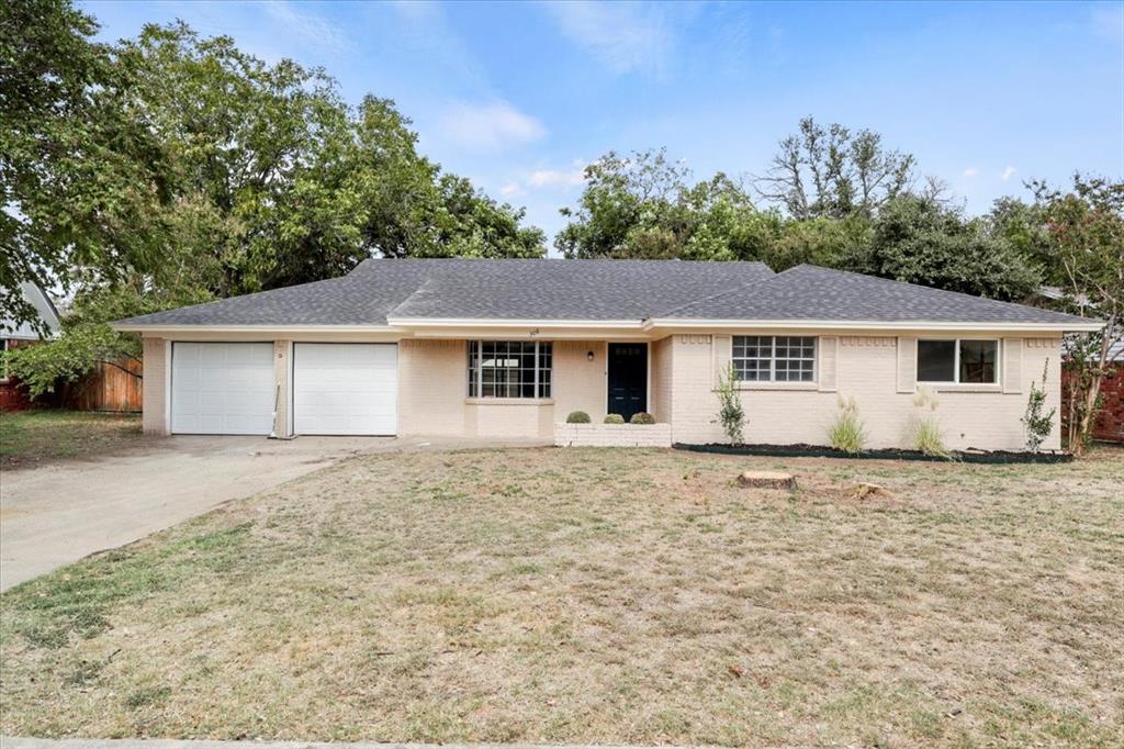 front view of a house and a yard