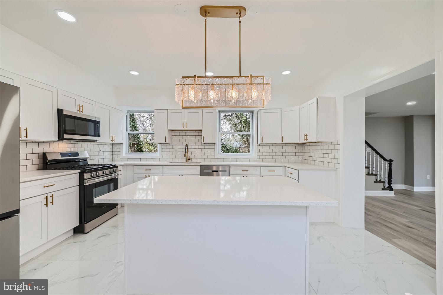 a large kitchen with cabinets