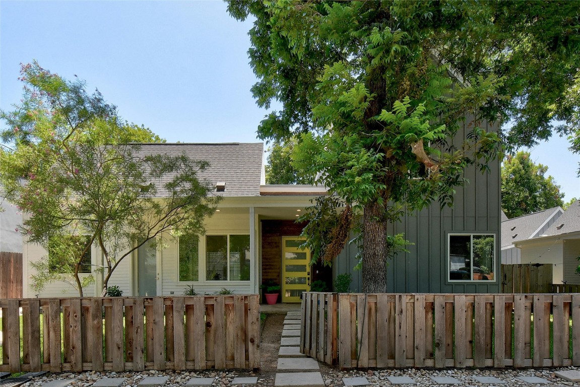 front view of a house with a small yard