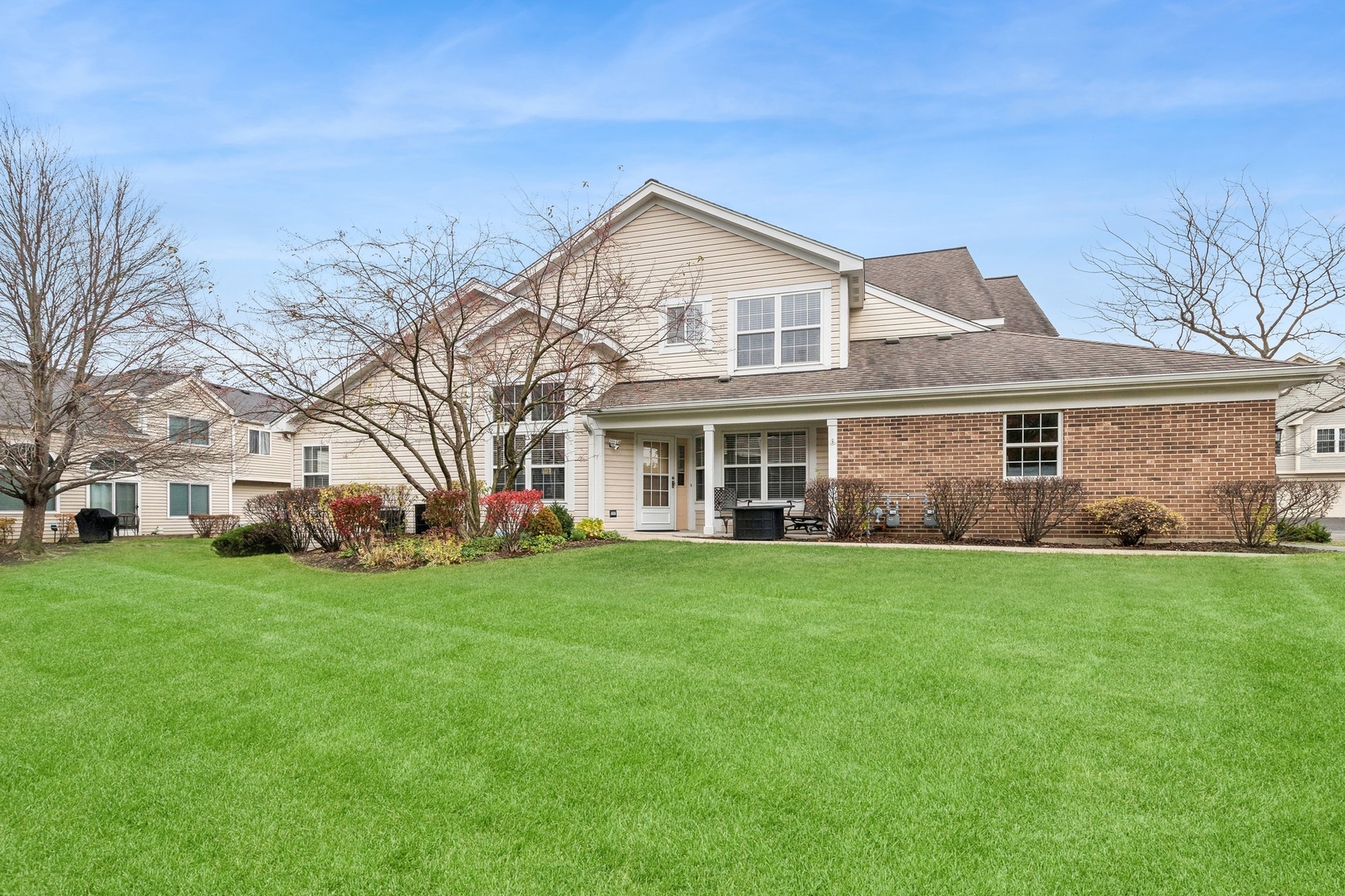 a view of a yard in front of a house