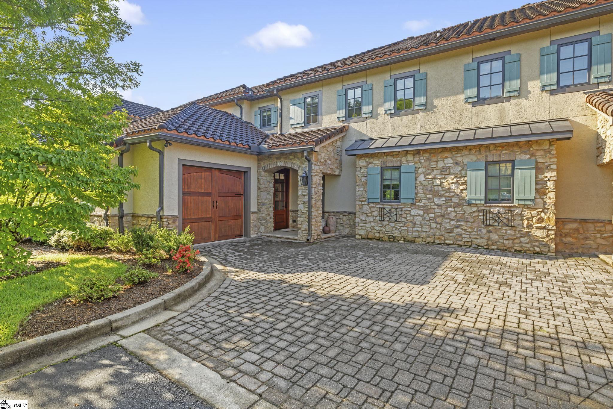 Cobblestone Driveway & Tuscan Inspired Architecture