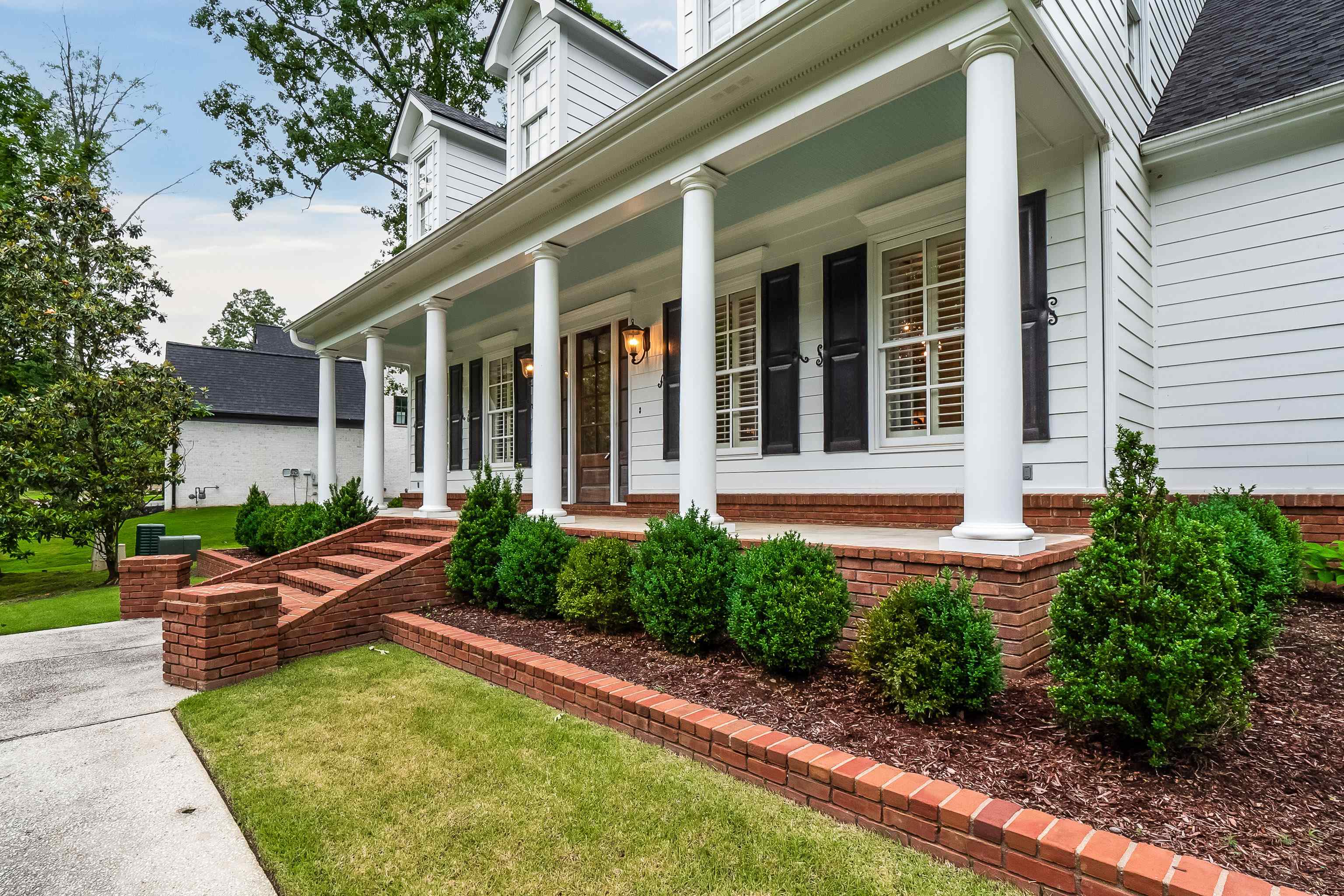 front view of a house with a yard