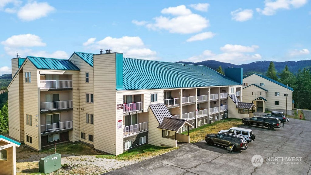 a front view of a house with parking