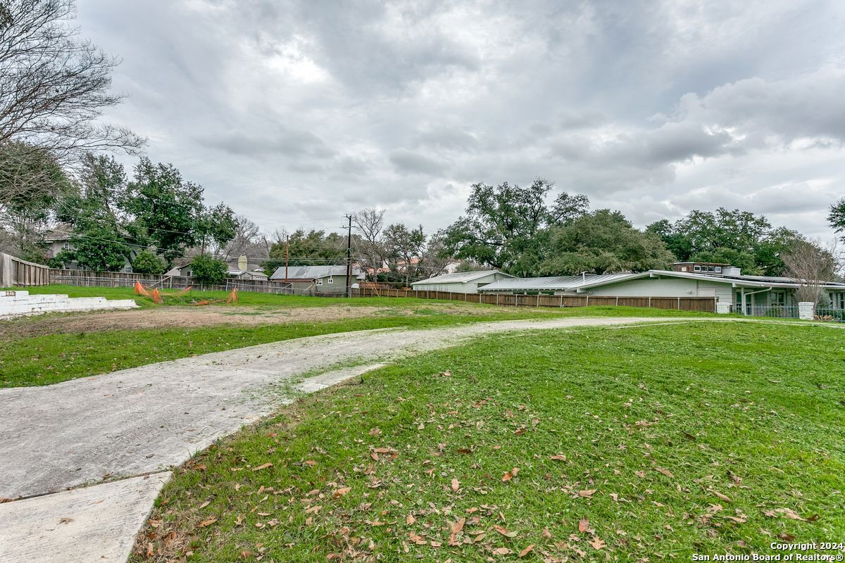 a view of a golf course with a lake