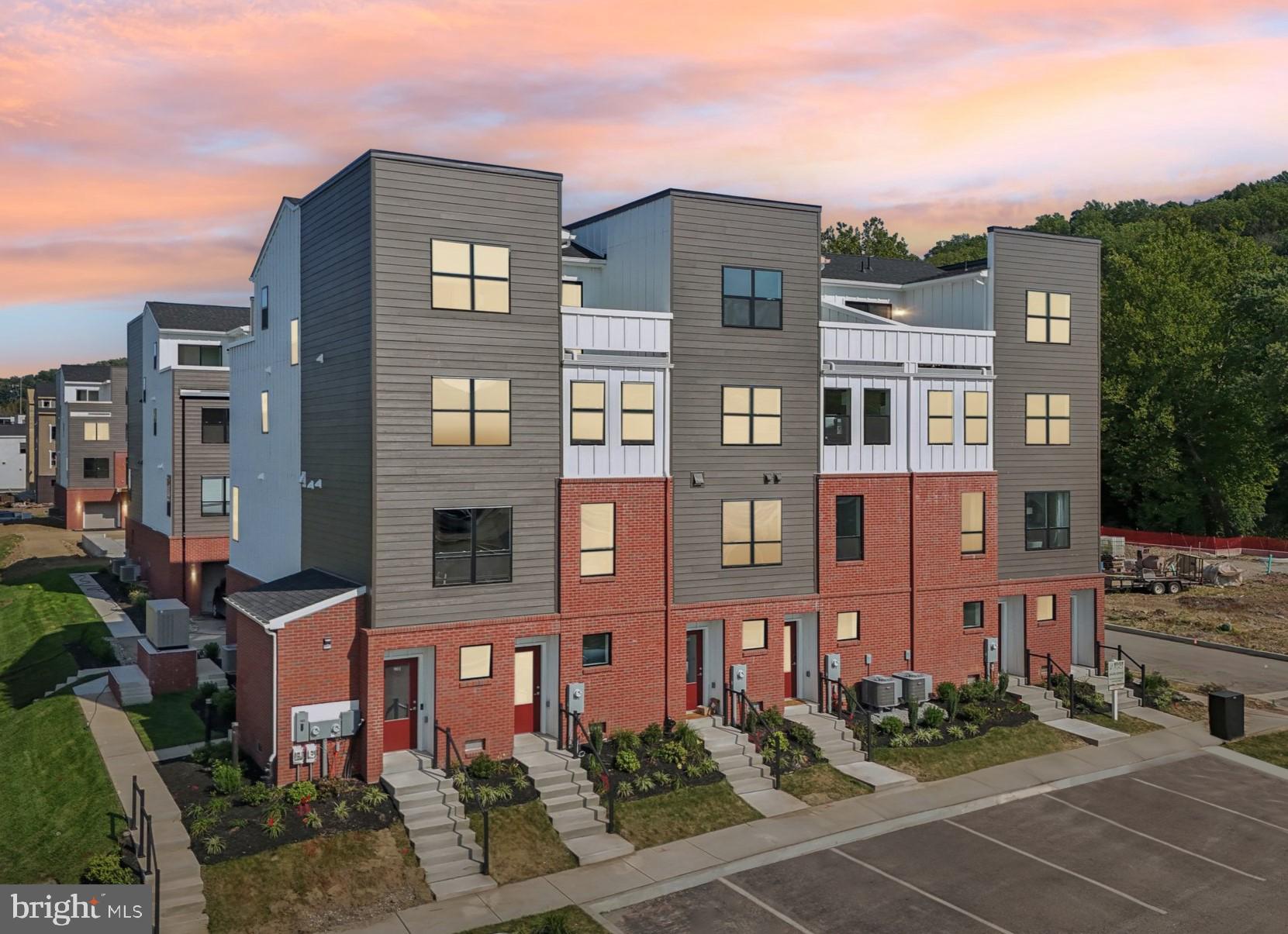 a front view of a multi story residential apartment building