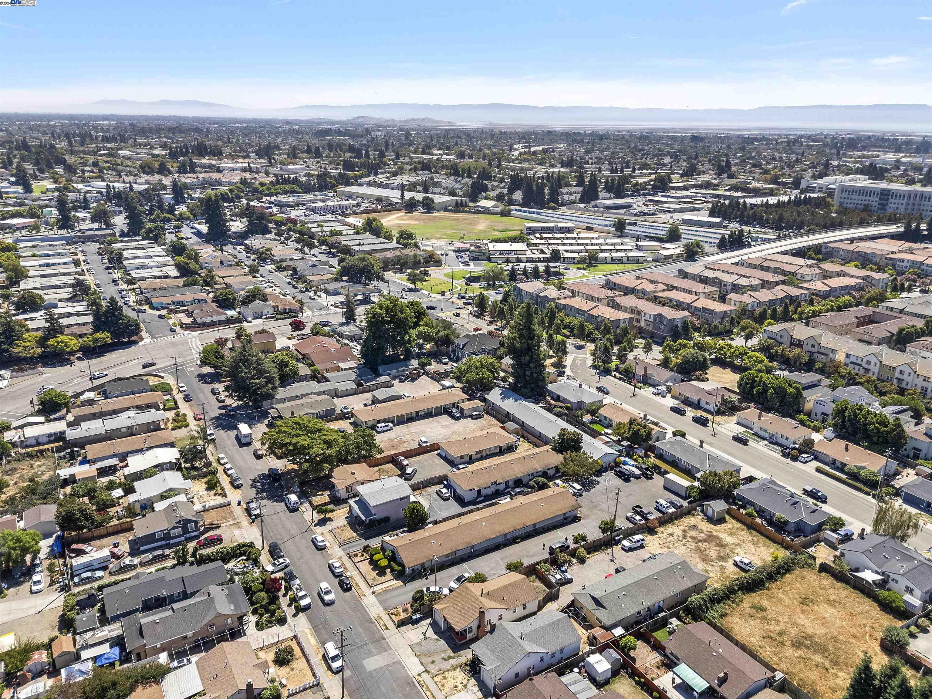 an aerial view of a city with lots of residential buildings