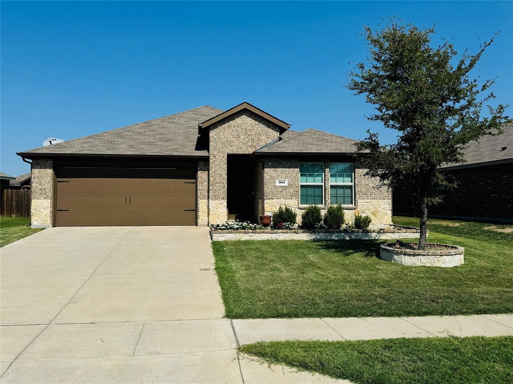 a front view of a house with swimming pool having outdoor seating