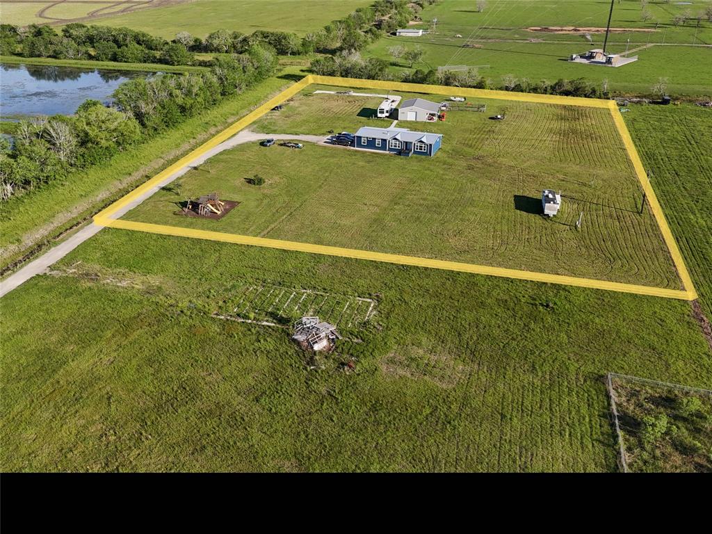 Sitting on just over 5 acres! The front acreage is available too, making this a 10 acre property!