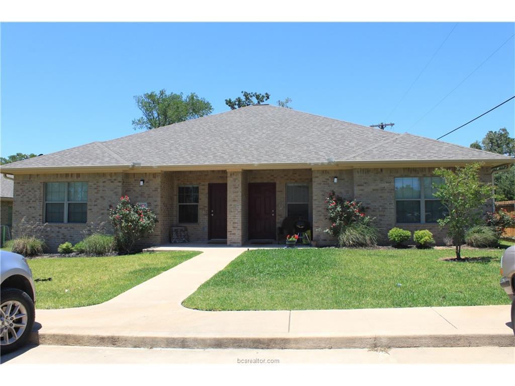 Ranch-style home with a front yard