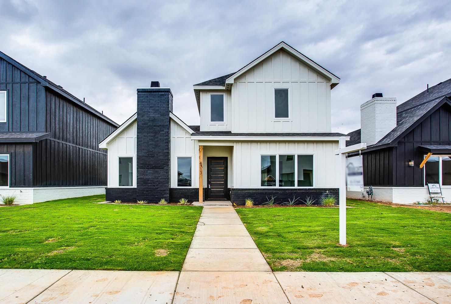 a front view of house with yard