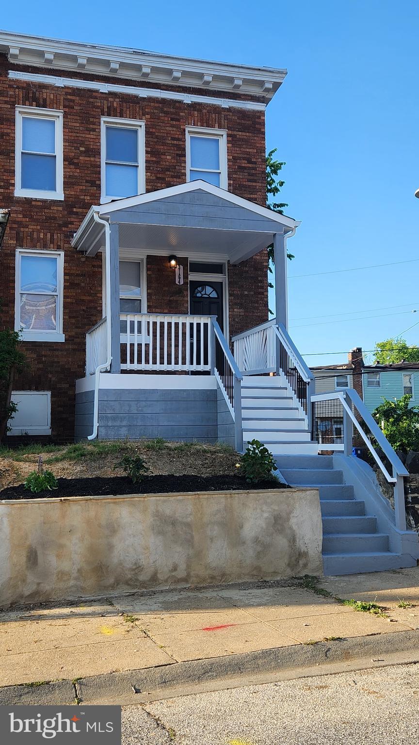 a view of a house with a balcony