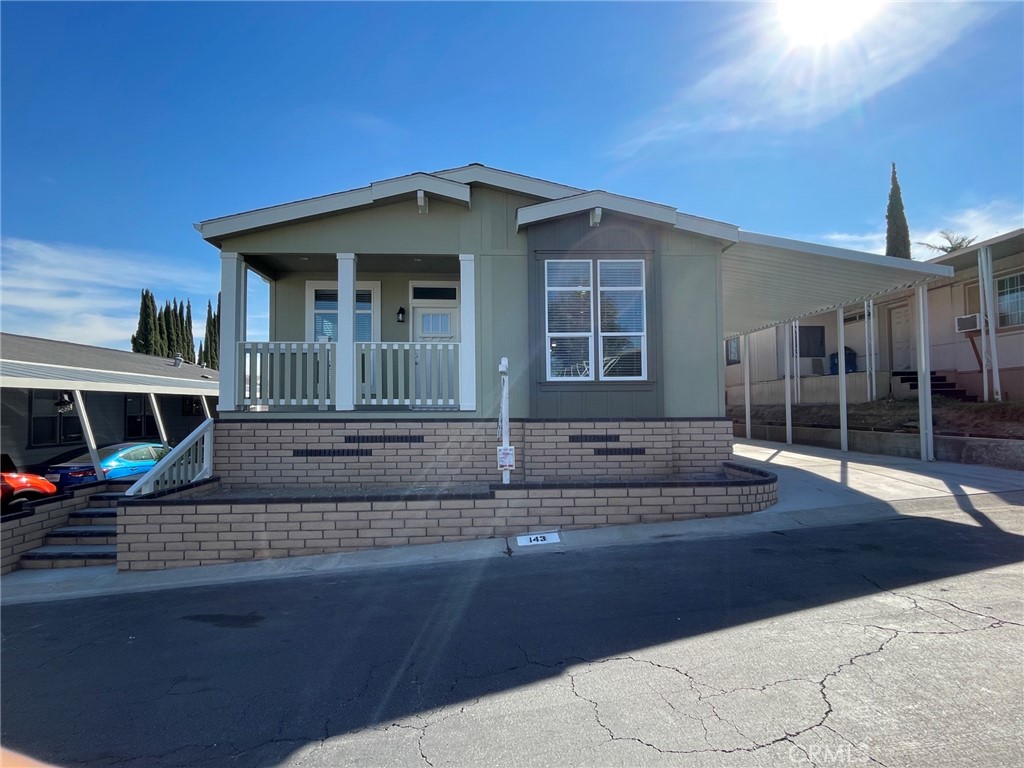 a front view of a house with garage