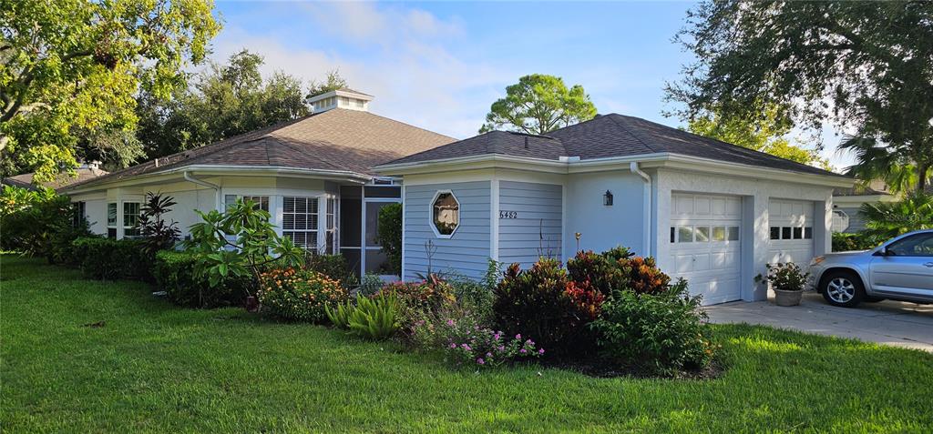 a house view with a garden space