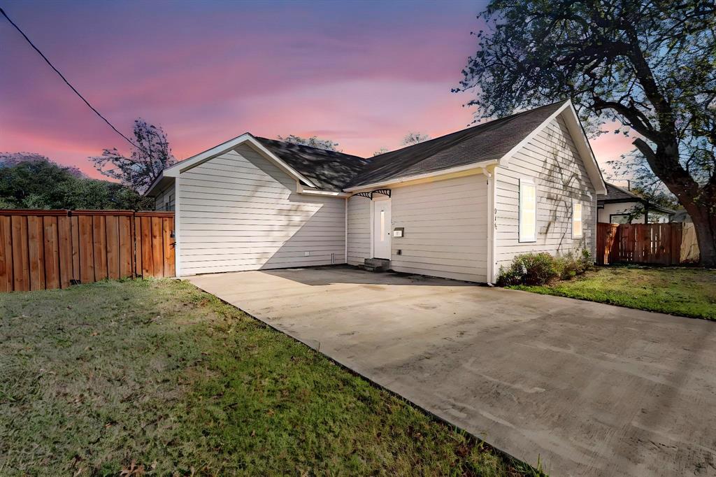 a house view with a backyard space