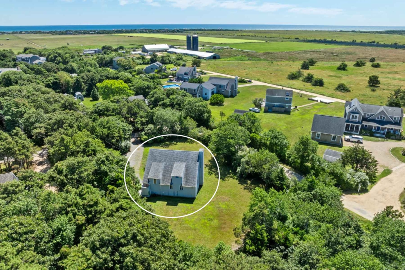 an aerial view of a house with a garden