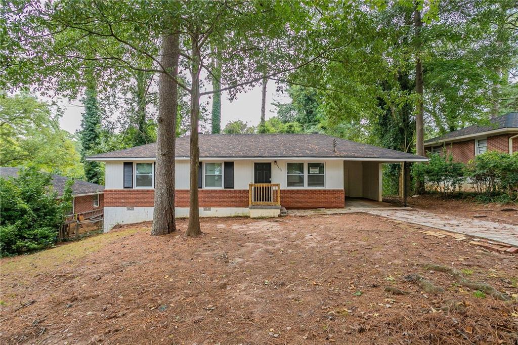 front view of a house with a yard