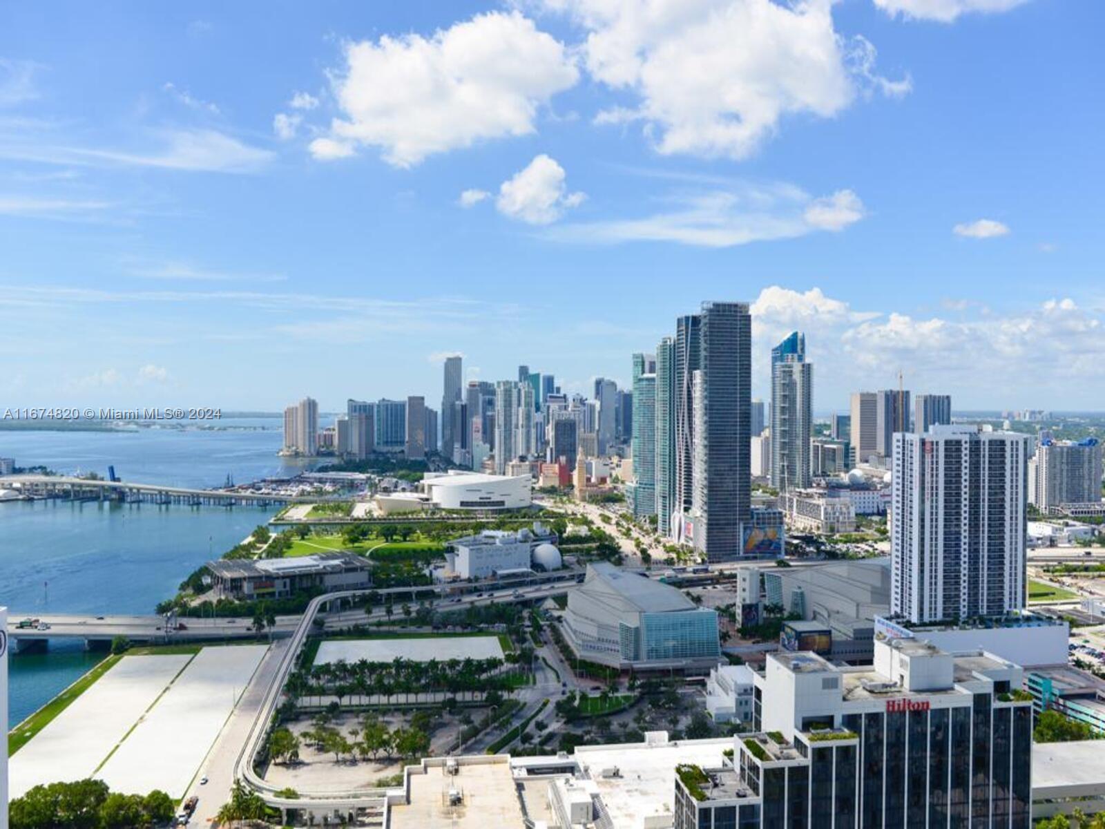 a view of a city with tall buildings