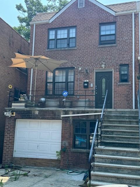 View of front facade with a garage