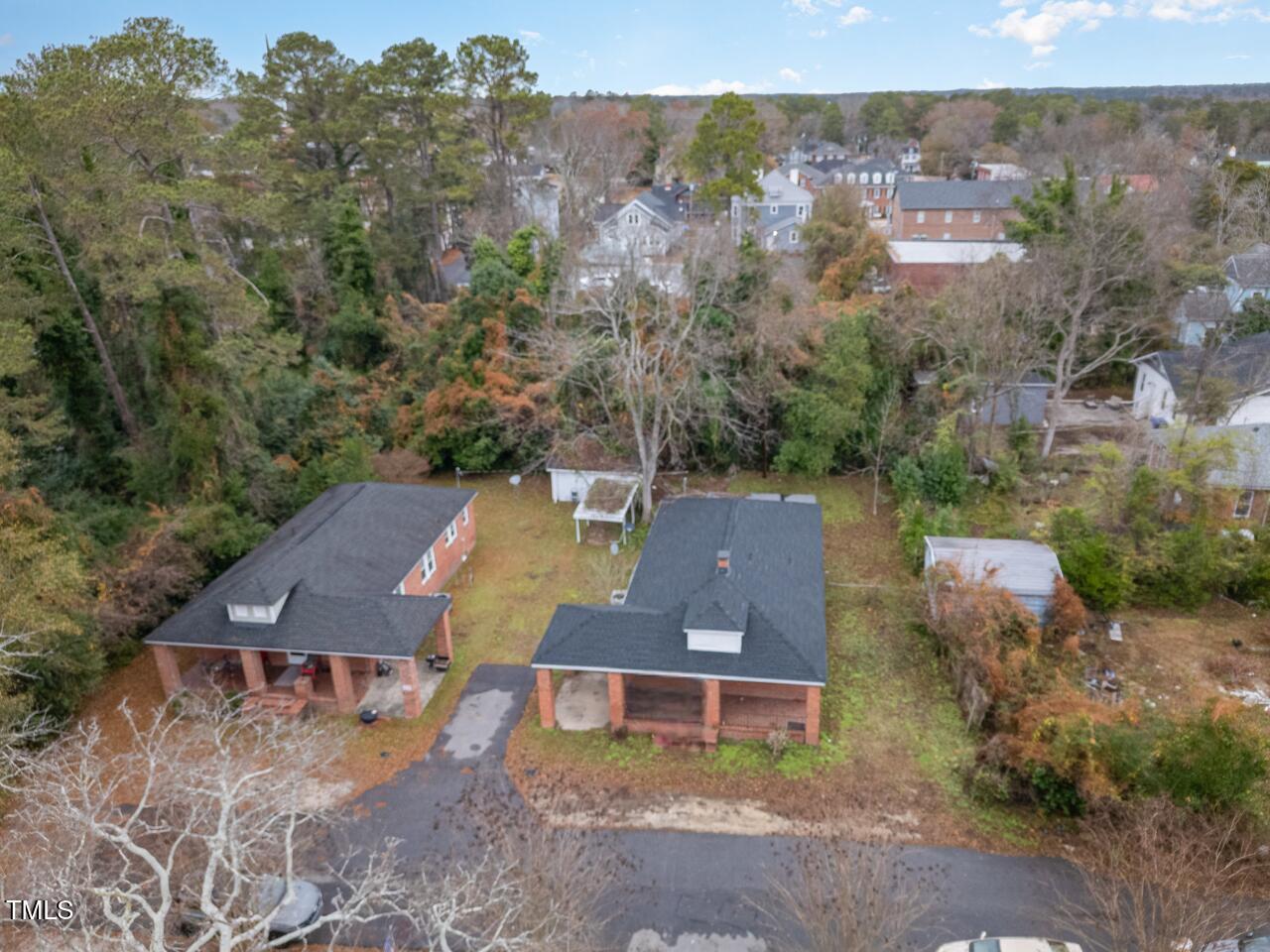 an aerial view of a house with a garden