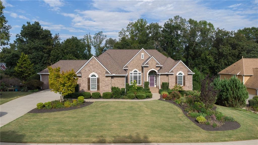 front view of a house with a yard