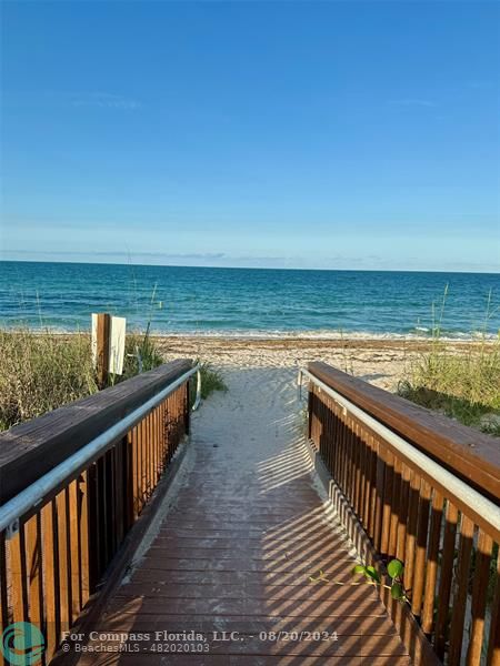 a view of ocean from a balcony