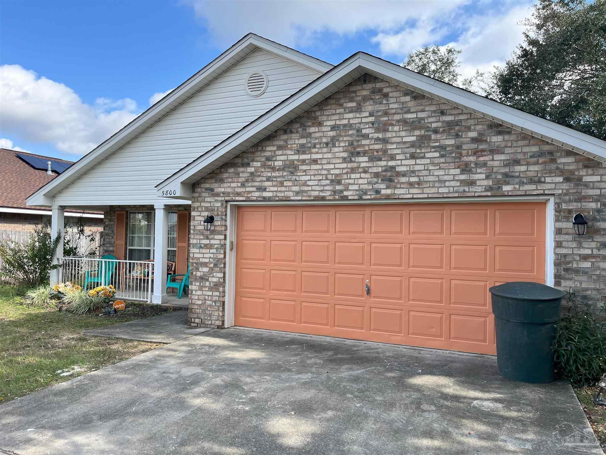 a view of a house with a garage