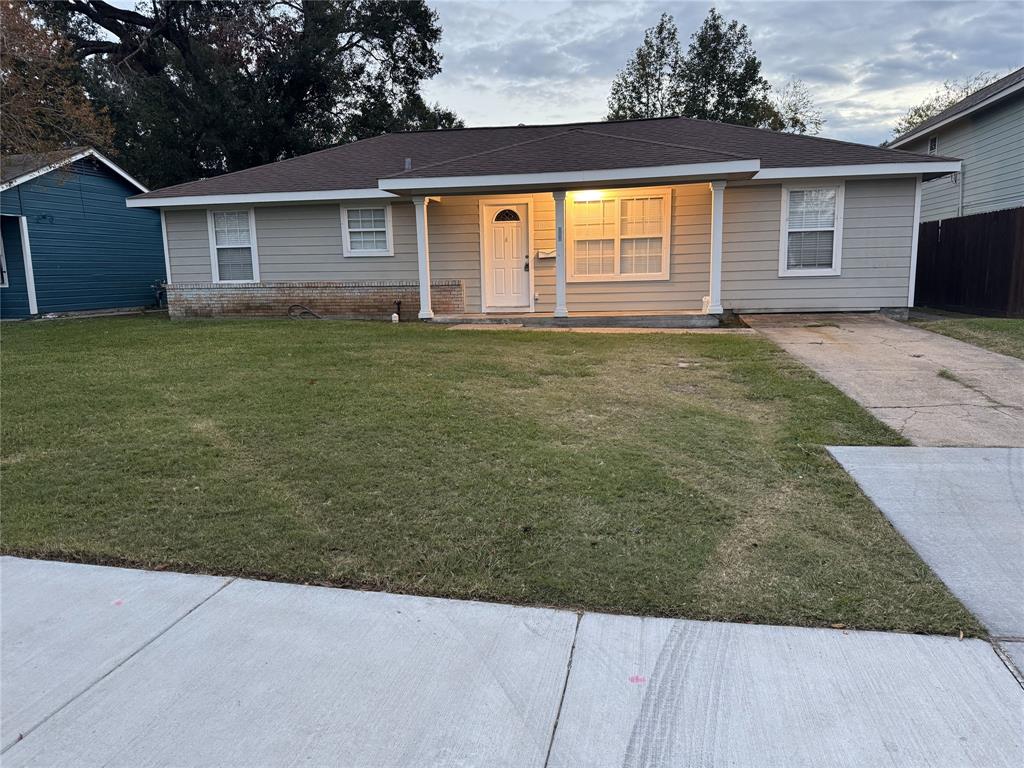 front view of house with a yard