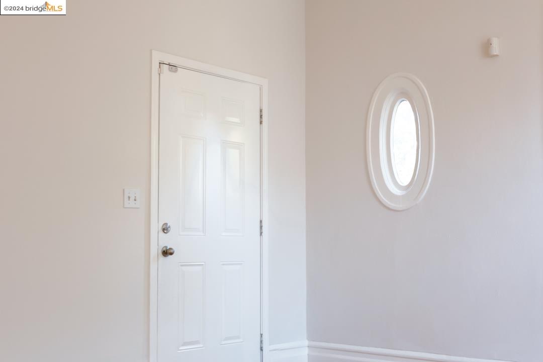 a close view of closet with mirror