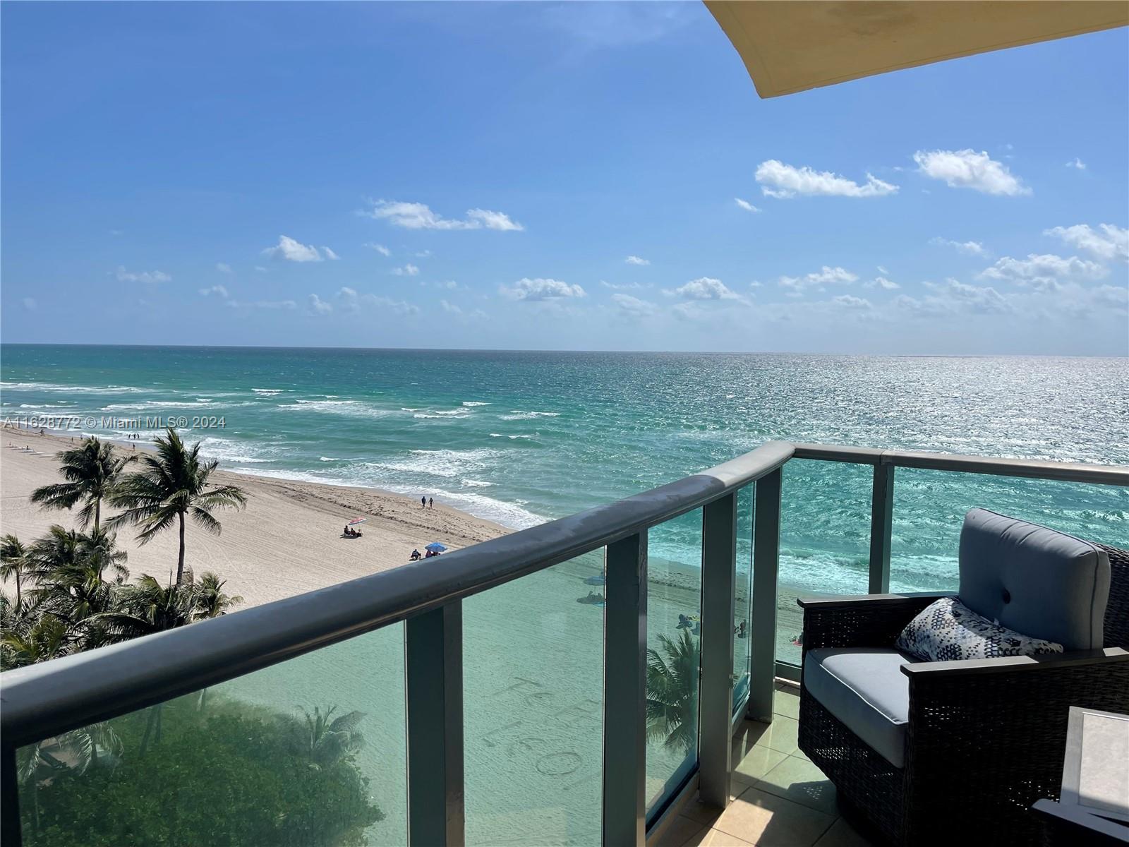 a view of a ocean from a balcony