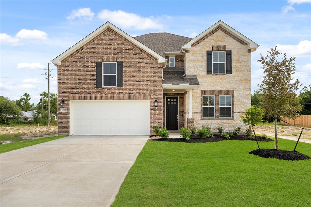 Stunning Omaha home design with elevation RA built by K. Hovnanian Homes in beautiful Centennial Oaks.