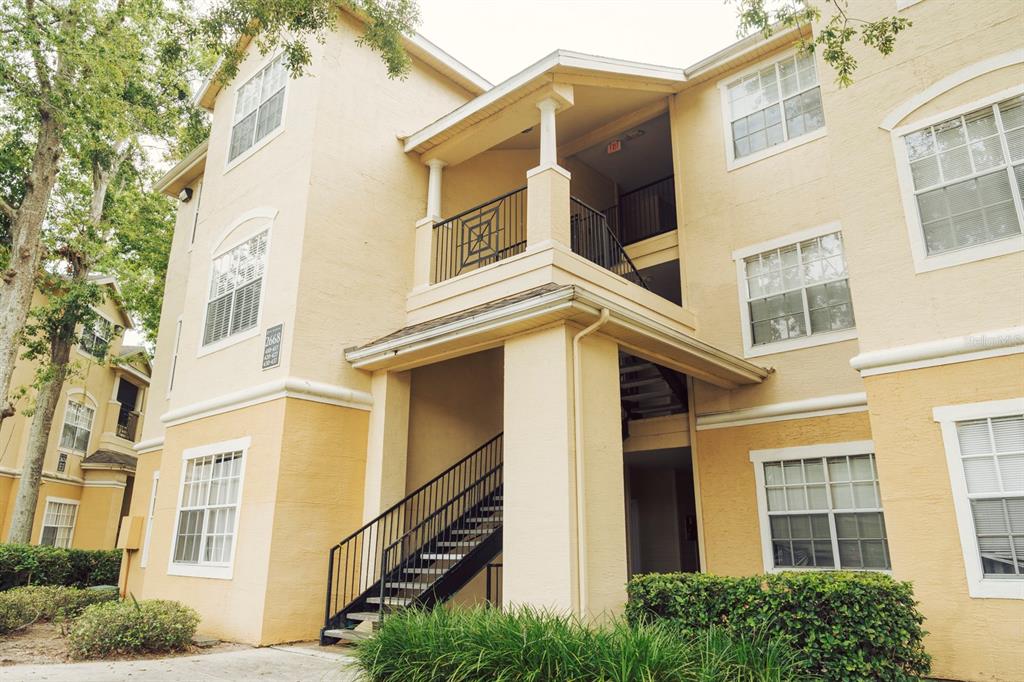 a front view of a multi story residential apartment building