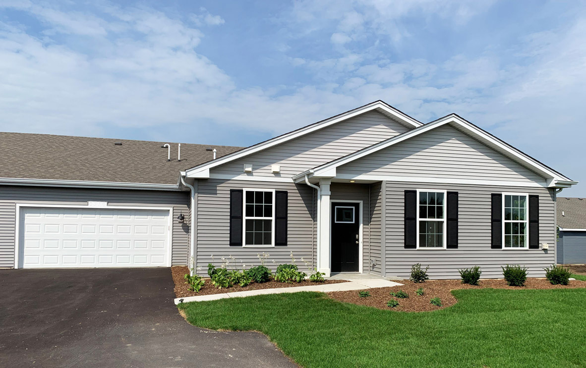 a front view of house with yard