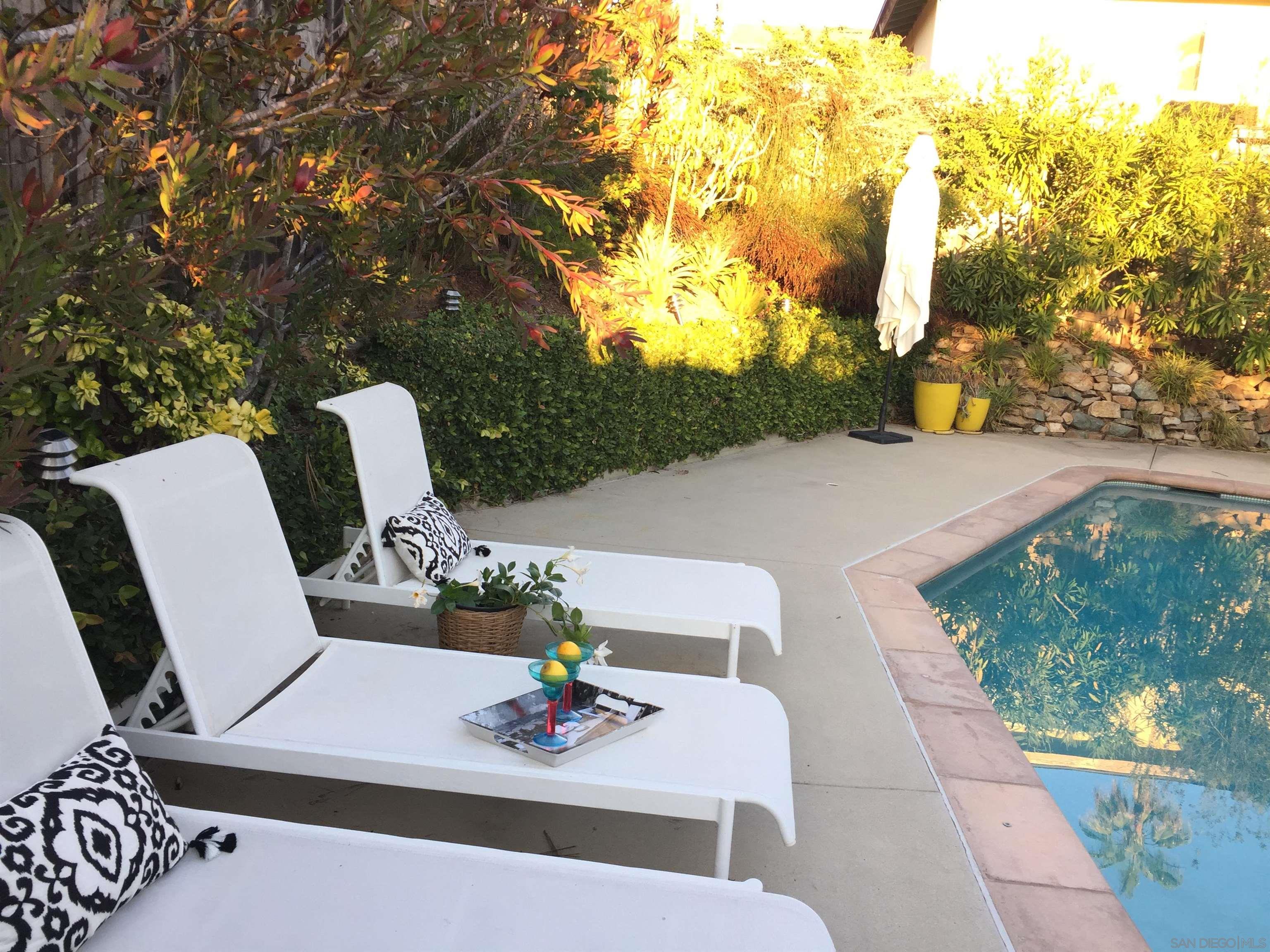 a view of table and chairs in the patio