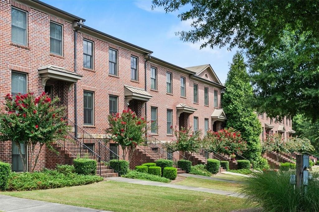 a front view of a multi story residential apartment buildings