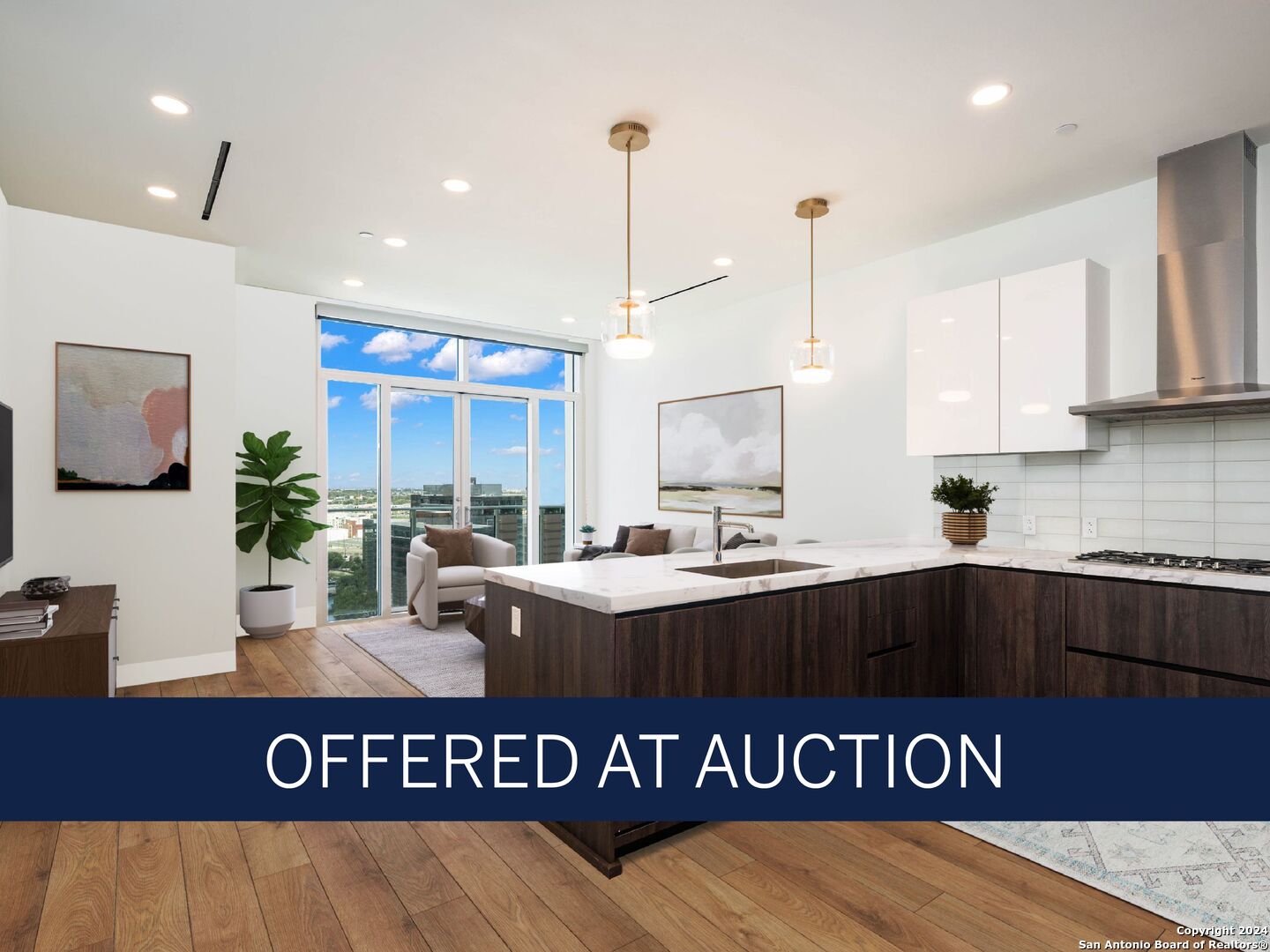 a view of kitchen with kitchen island stainless steel appliances sink stove and cabinets