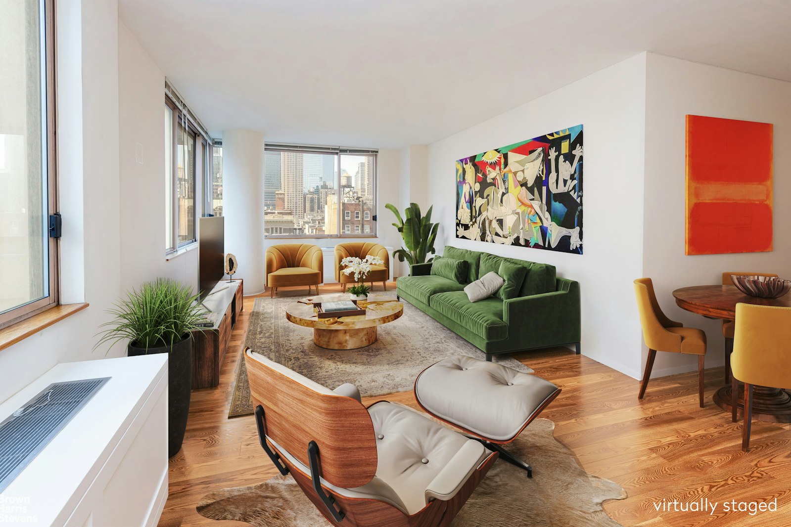 a living room with furniture and a potted plant