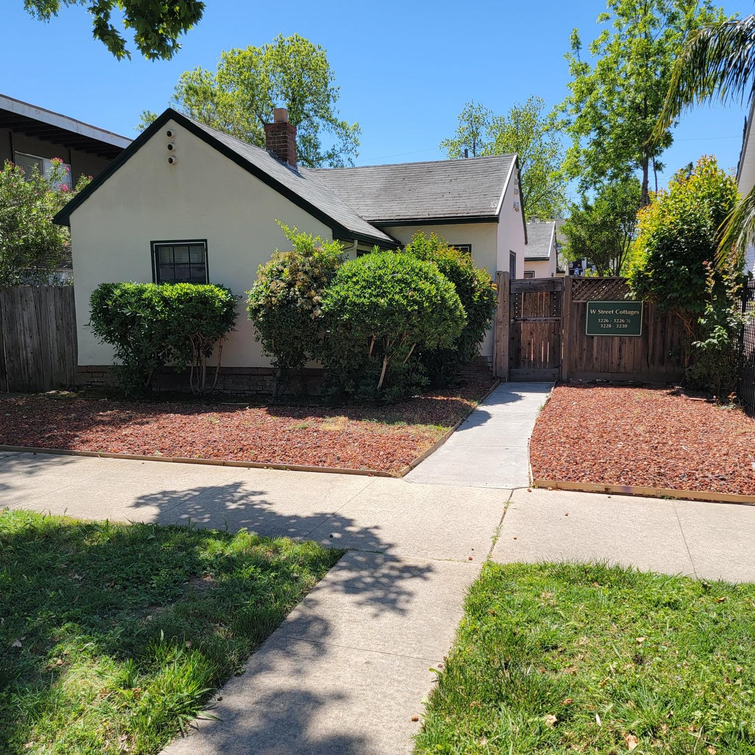 a view of backyard with garden and plants