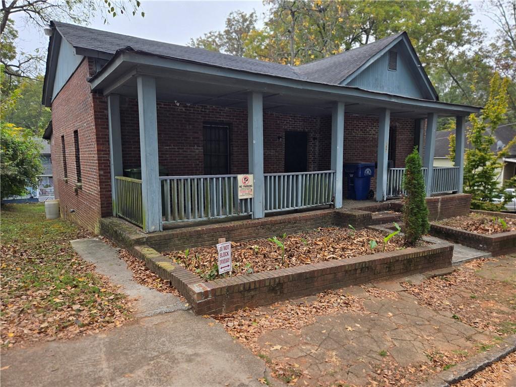 front view of a house with a small yard