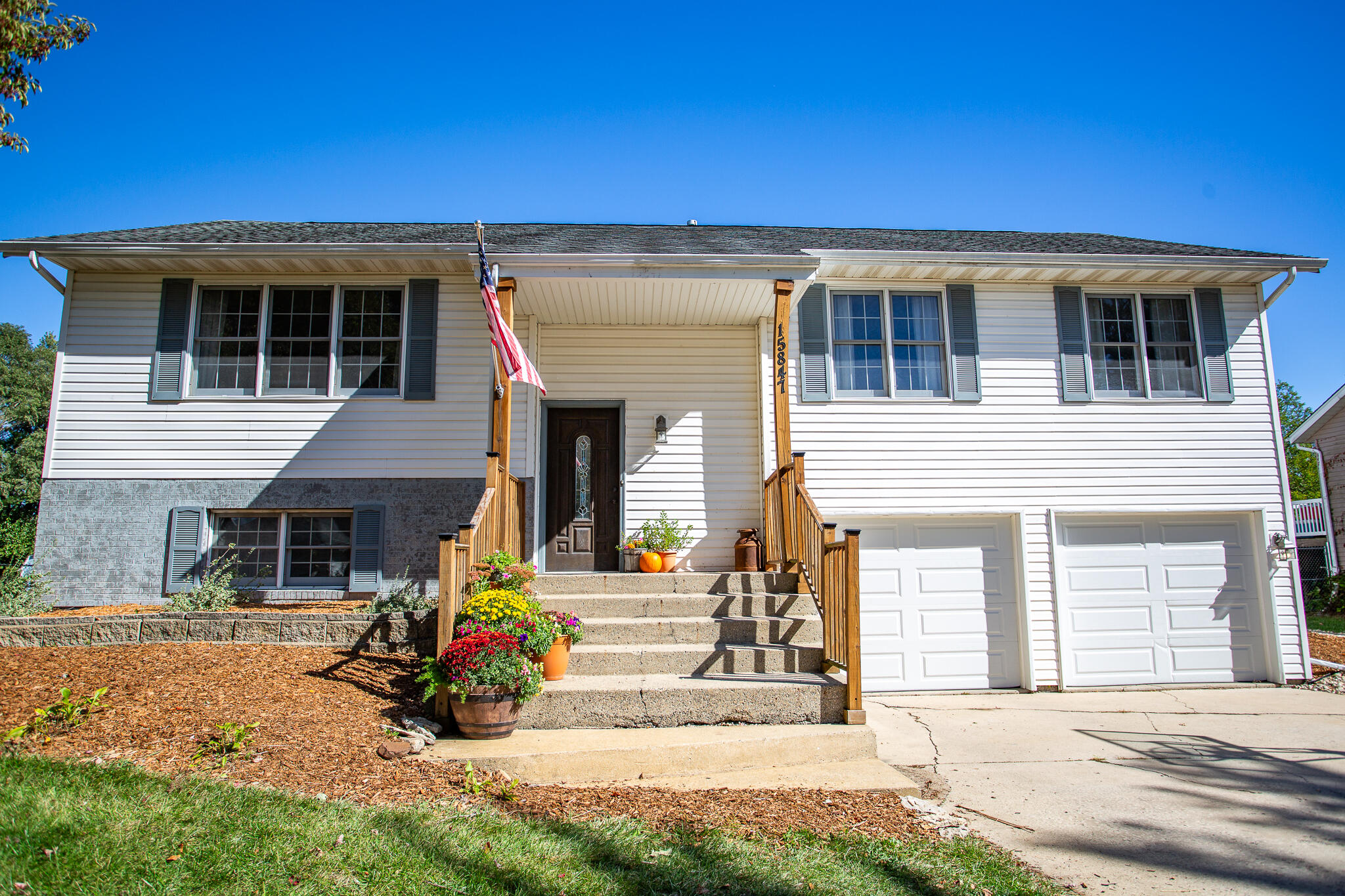 a view of house with outdoor space and porch