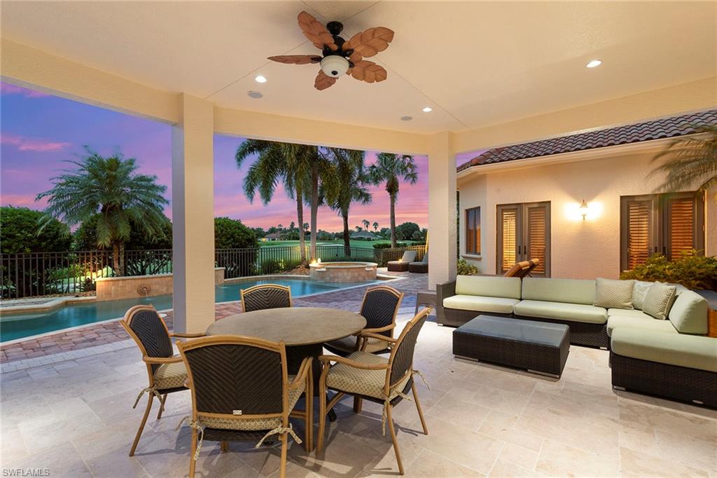 a dining room with furniture a garden and entryway