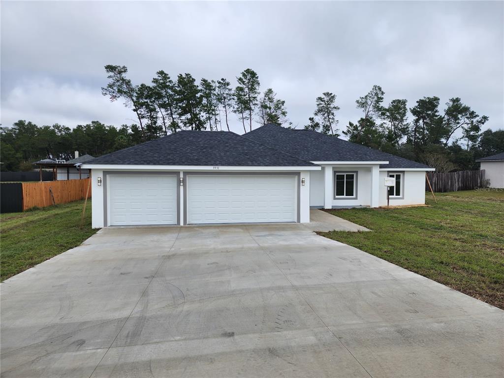 front view of house with a yard