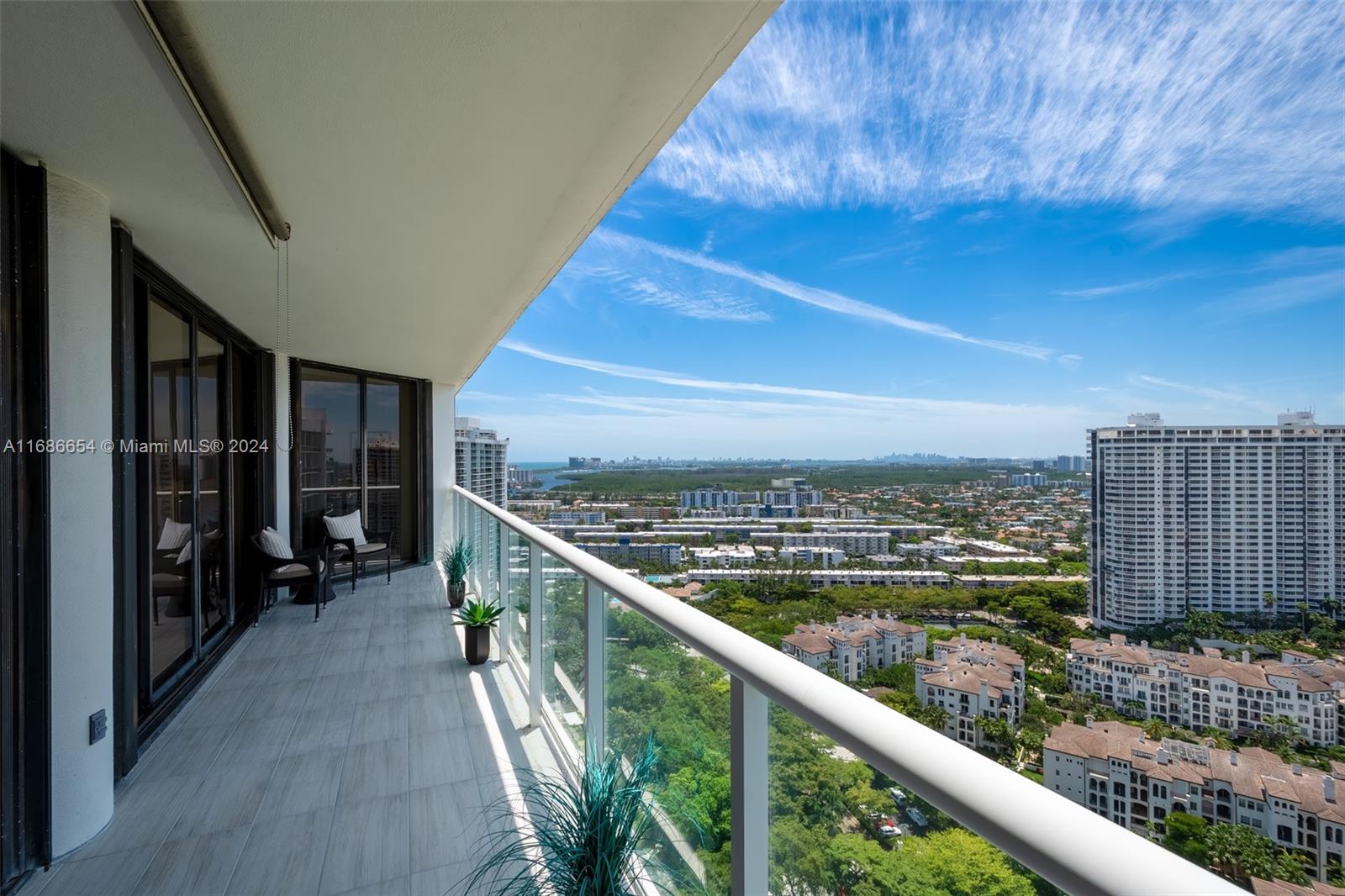 a view of balcony with city