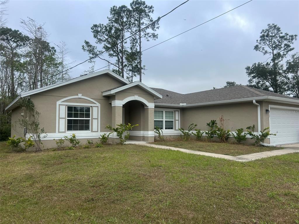 a front view of a house with patio