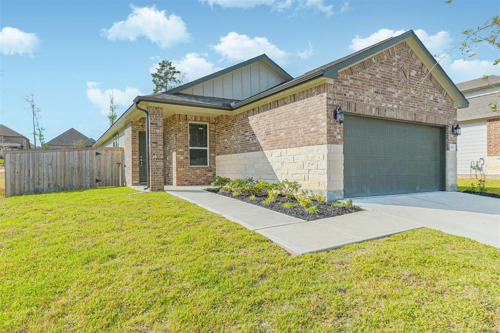 a house view with a backyard space